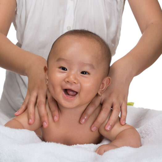 Laughing-baby-getting-massage-1_